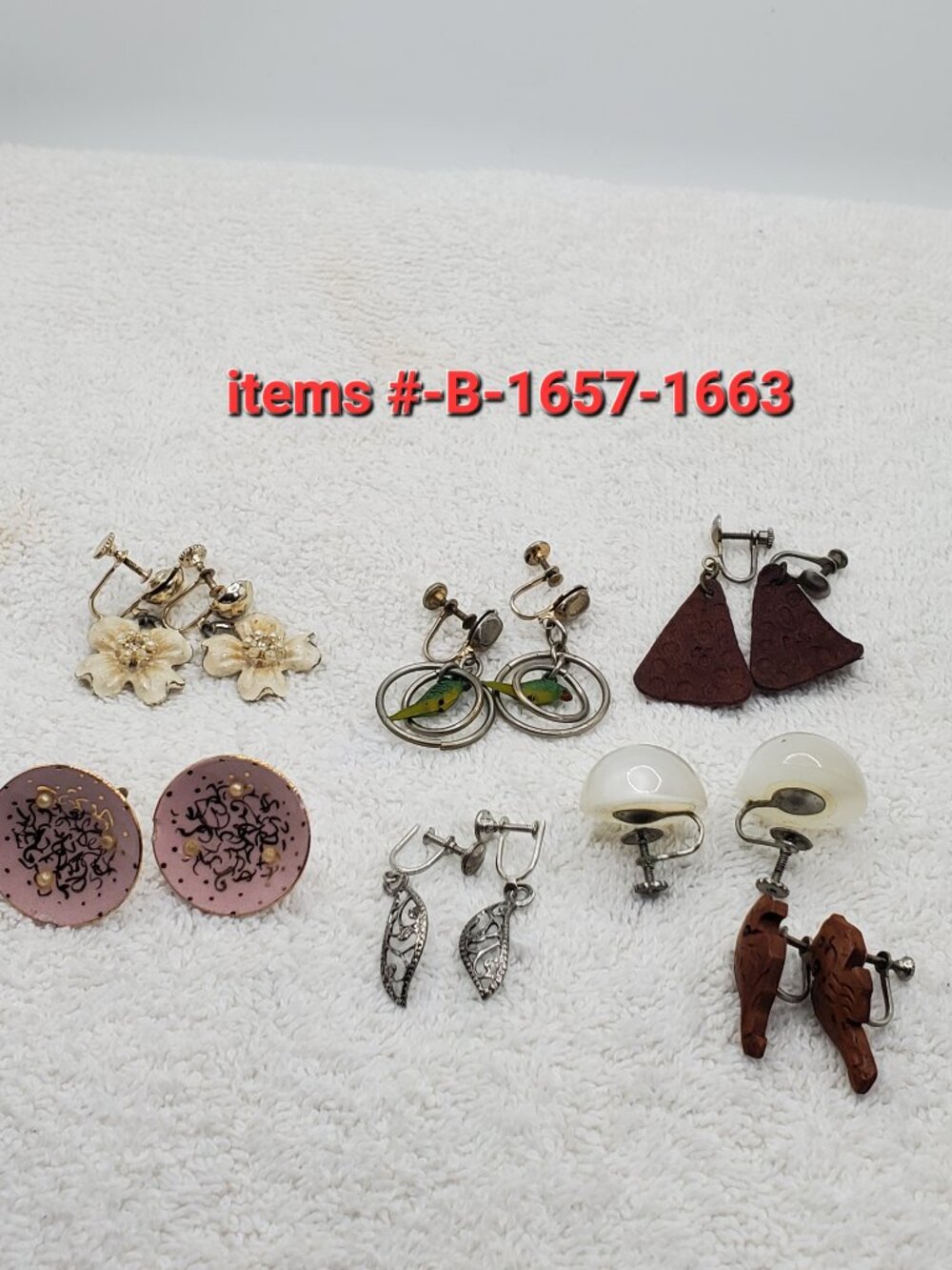 7 Pair of screw on Earrings, items # B- 1657-1663,.  wt. 41 grams.